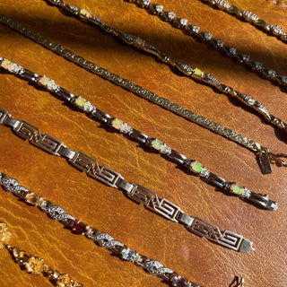 BRACELETS.