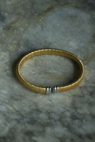 COILED BANGLE