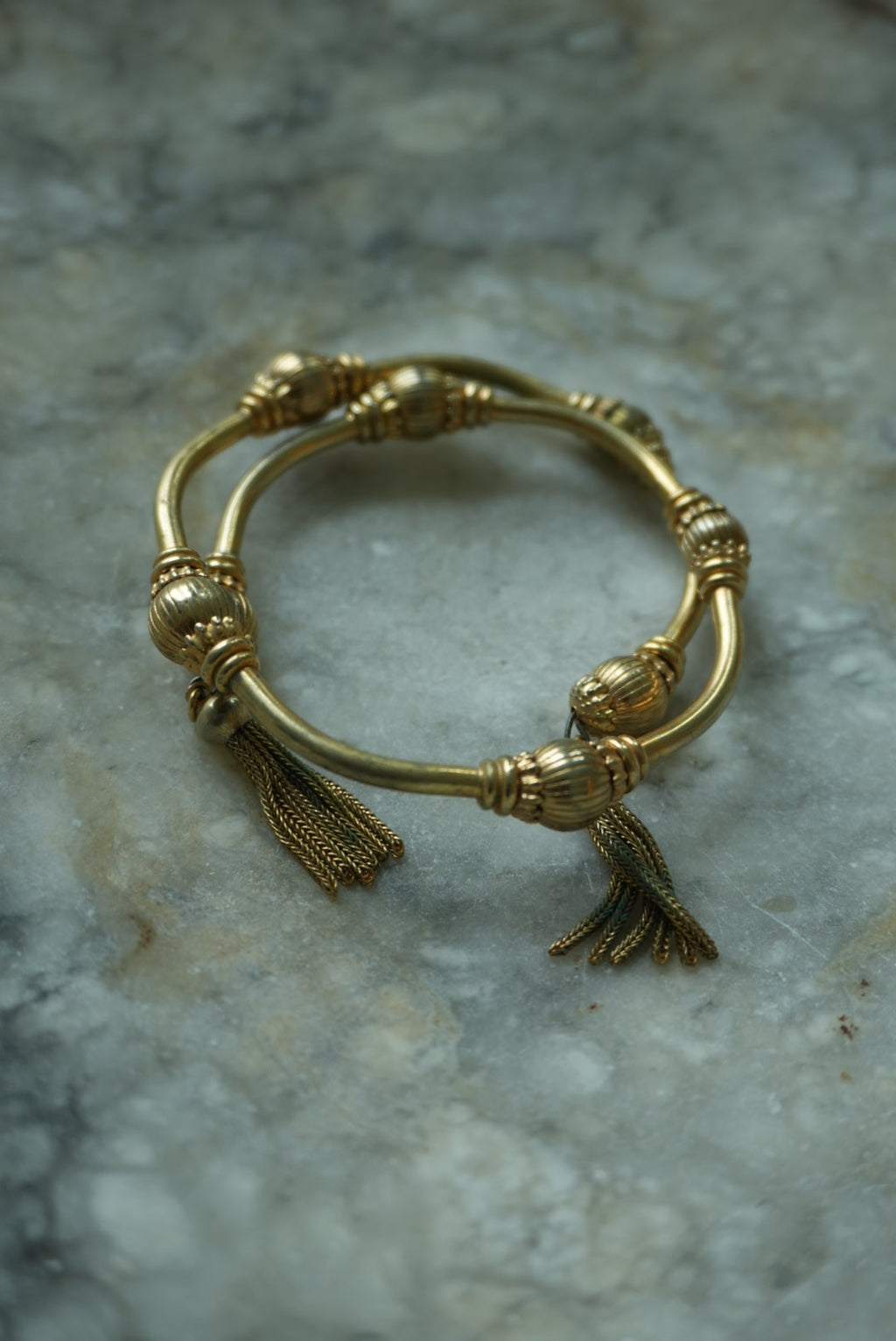 GOLDEN TASSEL BANGLE