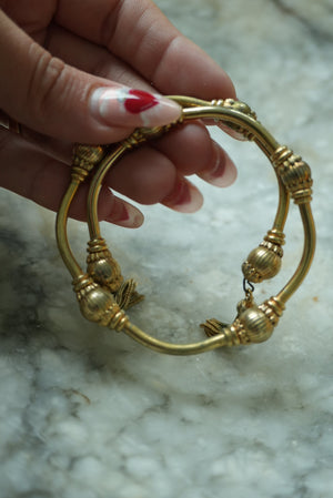 GOLDEN TASSEL BANGLE