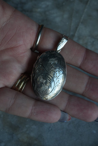 FOLKLORE LOCKET