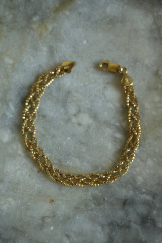 WOVEN STRANDS