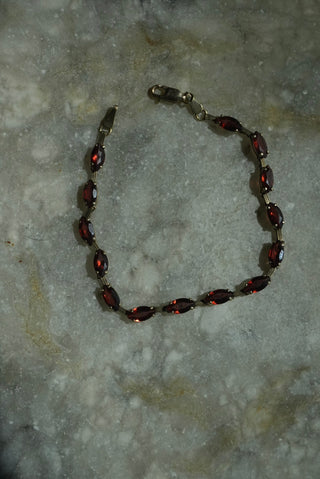 14K GARNET TENNIS BRACELET