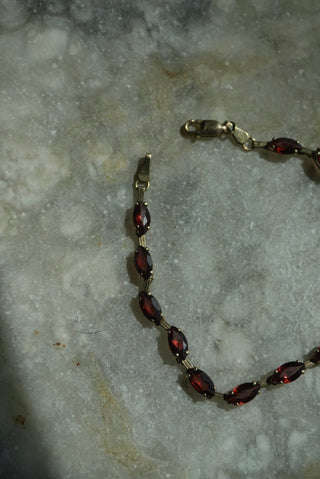 14K GARNET TENNIS BRACELET