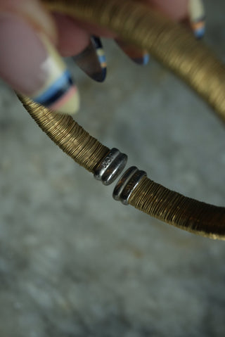 COILED BANGLE