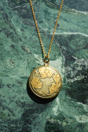 RARE FLORAL LOCKET