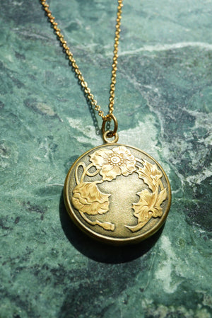 RARE FLORAL LOCKET