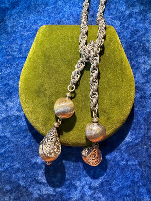 MONET LARIAT