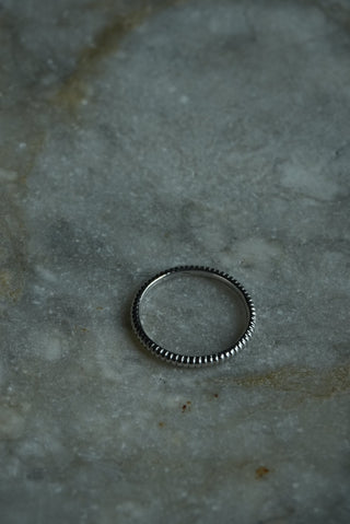 Spring Loaded - Sterling Stacking Band Size 10