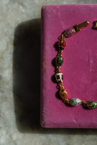 One Basket - Goldtone Enamel Egg Bracelet