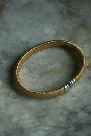 COILED BANGLE