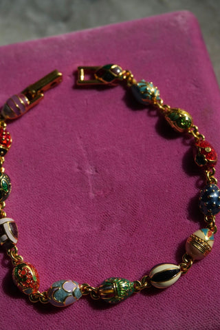 One Basket - Goldtone Enamel Egg Bracelet