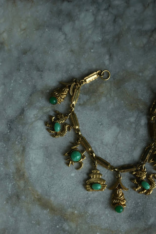CHARMED LIFE - GOLDTONE  CHARM BRACELET
