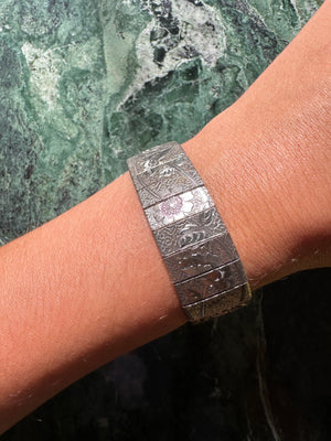 ETCHED IN SILVER